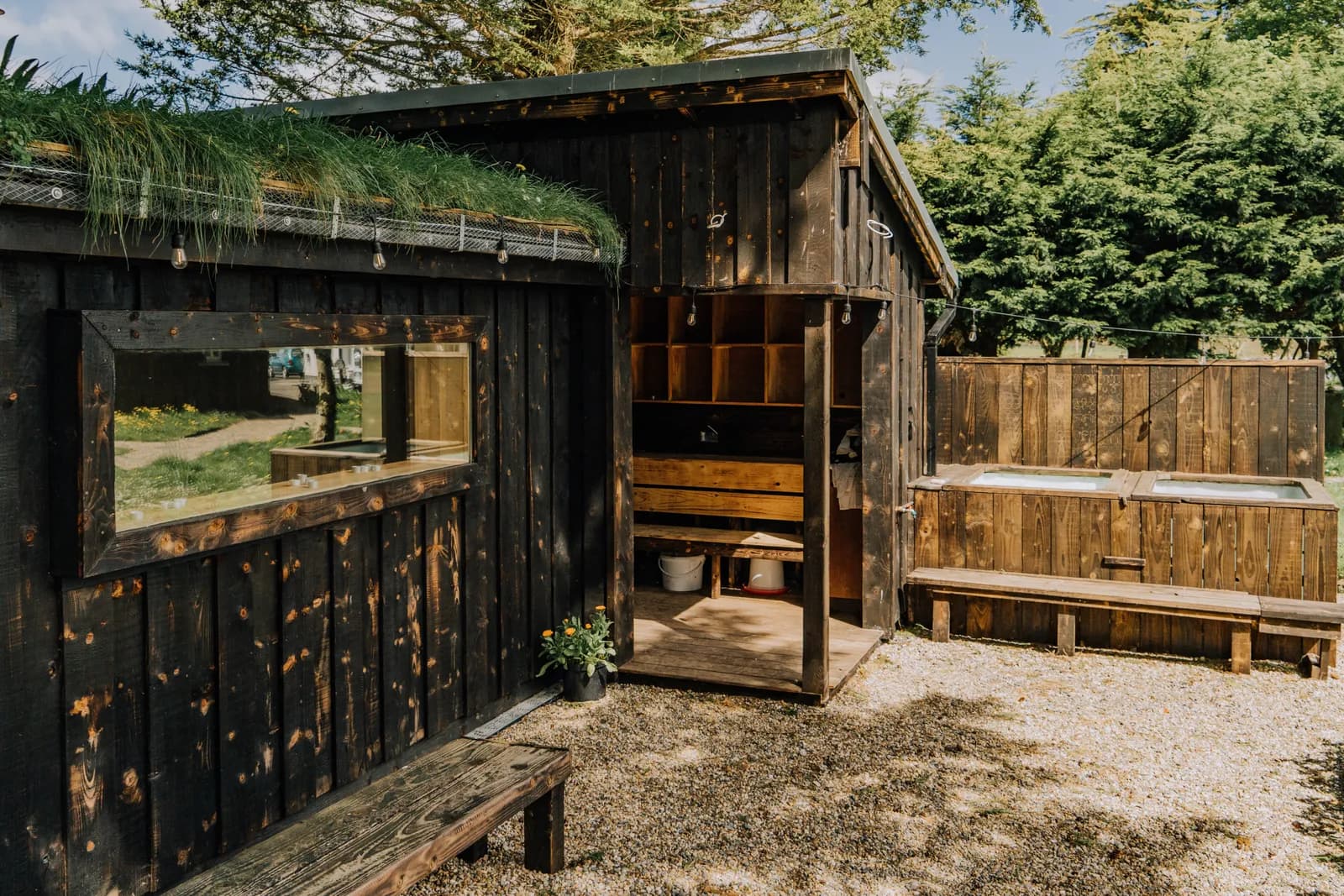 The wood-fired sauna building at Mad Yolk Farm